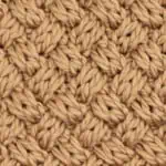 Basket Weave Cable Stitch Knit Stitch Pattern in brown-colored yarn by Studio Knit.