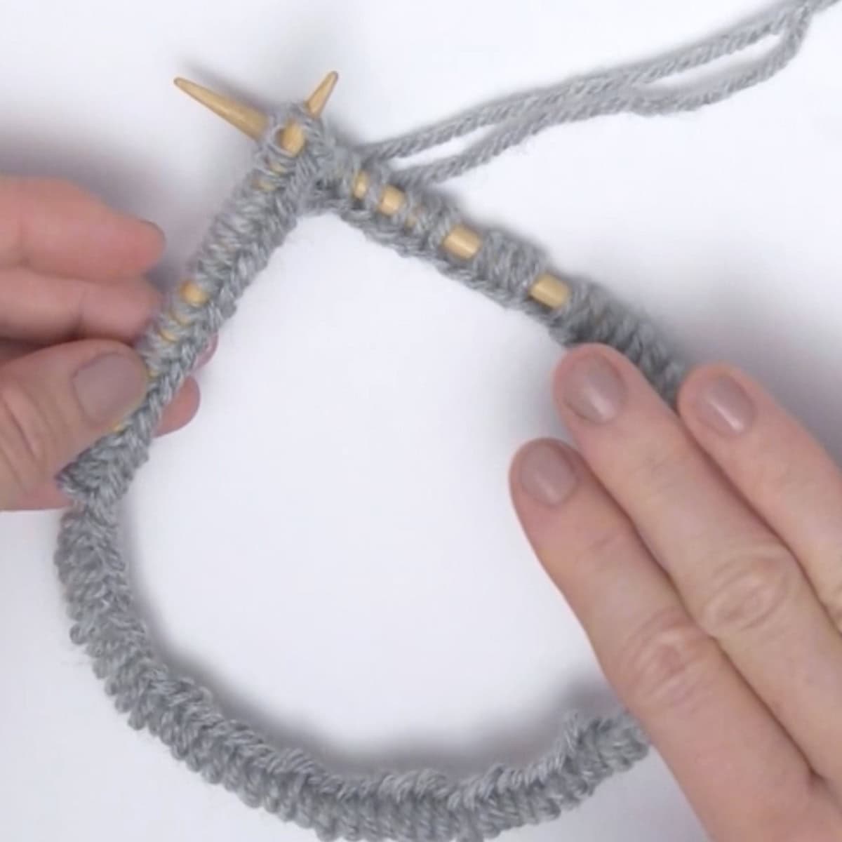 Knitted stitches on a circular needle.