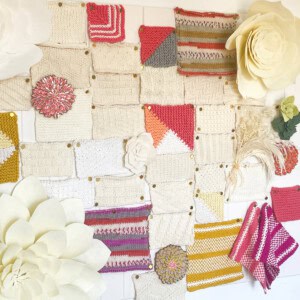 Wall display of knitted swatches.