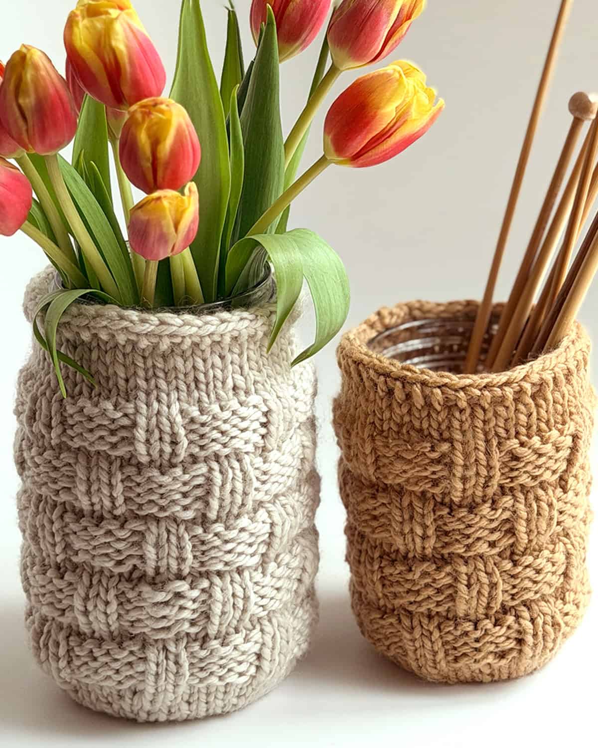 Basketweave Mason Jar Cozies styled with tulips and knitting needles for home décor and storage.